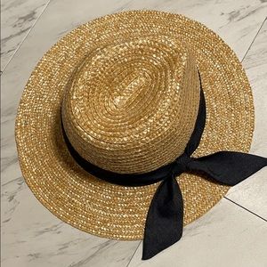 Target brand straw hat with denim tie.
